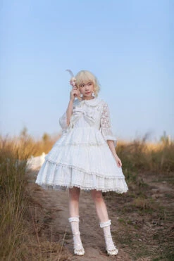 White Solid Color Tower Of Dawn Bowknot Sleeveless Ruffle Sweet Lolita Dress -LolitaInside 7feb7edd121395fafa85f578d69588ab